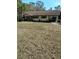 Charming single-story home with a well-maintained front yard and a carport at 7608 Chenkin, Zephyrhills, FL 33540