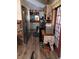 The galley kitchen features stainless steel appliances and a cozy, functional design at 7608 Chenkin, Zephyrhills, FL 33540