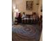 Bright and cozy living room featuring a unique braided rug at 7608 Chenkin, Zephyrhills, FL 33540