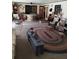 Spacious living room with a large rug and comfortable seating at 7608 Chenkin, Zephyrhills, FL 33540
