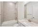 Clean and modern bathroom with a tiled shower, built-in tub, and a sleek vanity with modern fixtures at 8316 Golden Beach Ct, Parrish, FL 34219