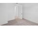 Bright, carpeted bedroom with white walls, trim, and ample space, enhancing the sense of openness at 8316 Golden Beach Ct, Parrish, FL 34219