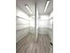 Walk-in closet with shelving and racks for maximum storage at 8316 Golden Beach Ct, Parrish, FL 34219