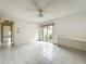 Bright bedroom with sliding door access to a private patio at 8822 Misty Creek Dr, Sarasota, FL 34241