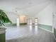 Bright and airy living room with tile flooring and sliding glass doors to outdoor living space at 8822 Misty Creek Dr, Sarasota, FL 34241