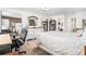 Bright bedroom with a large bed, desk, and ample storage at 9521 86Th Ave # 9521, Seminole, FL 33777