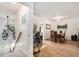 Bright dining room features hardwood floors, adjacent to the staircase and office area at 9521 86Th Ave # 9521, Seminole, FL 33777