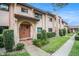 Charming two-story townhome featuring private entrances and well-maintained landscaping at 9521 86Th Ave # 9521, Seminole, FL 33777
