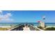 Stunning beach access with clear skies, promising residents easy access to relaxation and recreation at 960 Virginia St # 202, Dunedin, FL 34698