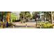 Charming street view of the community with colorful shops and inviting atmosphere for leisurely strolls at 960 Virginia St # 202, Dunedin, FL 34698