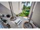 Overhead shot of the beautiful courtyard with picnic table and landscaping at 960 Virginia St # 202, Dunedin, FL 34698