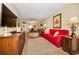 Spacious living area with a blend of comfortable seating and contemporary decor at 960 Virginia St # 202, Dunedin, FL 34698