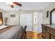 Bedroom featuring hard wood floors and closet at 9892 111Th St, Seminole, FL 33772