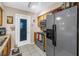Bright kitchen featuring stainless steel appliances and access to the backyard at 9892 111Th St, Seminole, FL 33772