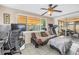 Bright sun room with a large window and a sliding glass door providing access to the screened in lanai at 9892 111Th St, Seminole, FL 33772