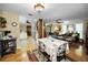 Open-concept dining area featuring views into multiple rooms, and natural light at 1151 Lancer Ln, Tarpon Springs, FL 34689