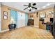 Bright office with parquet floors, natural light, and a work area at 1151 Lancer Ln, Tarpon Springs, FL 34689
