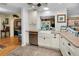 Bright kitchen with modern appliances and a farmhouse sink at 1151 Lancer Ln, Tarpon Springs, FL 34689