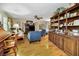 Spacious living room with hardwood floors and abundant natural light at 1151 Lancer Ln, Tarpon Springs, FL 34689