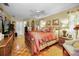 Comfortable main bedroom with a ceiling fan and natural light at 1151 Lancer Ln, Tarpon Springs, FL 34689