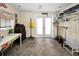 Multi-purpose room with tiled floors and access to storage at 1151 Lancer Ln, Tarpon Springs, FL 34689