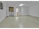 Spacious basement with laundry machines and white walls at 12807 Starling Dr, Odessa, FL 33556