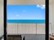 A relaxing balcony overlooking the ocean, with seating at 13500 Gulf Blvd # 507, Madeira Beach, FL 33708