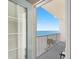 Balcony overlooking the ocean, with beach views at 13500 Gulf Blvd # 507, Madeira Beach, FL 33708