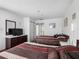 Bedroom with two beds and television at 13500 Gulf Blvd # 507, Madeira Beach, FL 33708