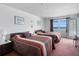 Bedroom with two beds and ocean view at 13500 Gulf Blvd # 507, Madeira Beach, FL 33708
