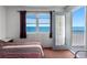 Bedroom with ocean view at 13500 Gulf Blvd # 507, Madeira Beach, FL 33708