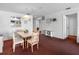 Cozy dining room with seating for six and view to kitchen at 13500 Gulf Blvd # 507, Madeira Beach, FL 33708
