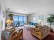 Inviting living room with ocean view, ideal for relaxation and enjoying scenic views at 13500 Gulf Blvd # 507, Madeira Beach, FL 33708