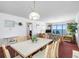 Bright living room features ocean views, comfortable seating, and inviting decor at 13500 Gulf Blvd # 507, Madeira Beach, FL 33708