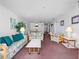Spacious living room featuring comfortable seating and ample natural light at 13500 Gulf Blvd # 507, Madeira Beach, FL 33708
