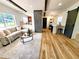 Bright and open living area with modern finishes and ample seating at 1373 Fairfax Rd, Clearwater, FL 33764