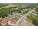 Expansive aerial view of the homes in a charming neighborhood with mature trees at 14494 Copeland Way, Brooksville, FL 34604