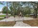Paver patio with brick fireplace, perfect for outdoor entertaining at 14494 Copeland Way, Brooksville, FL 34604
