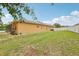 Expansive backyard with privacy fence and lush green lawn, offering plenty of room for outdoor activities at 14494 Copeland Way, Brooksville, FL 34604