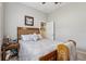 Comfortable bedroom featuring a classic wooden bedframe and a closet at 14494 Copeland Way, Brooksville, FL 34604