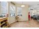 Bright breakfast nook with tile flooring, lots of windows, and a wine rack at 14494 Copeland Way, Brooksville, FL 34604