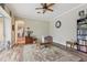 Open living room with a beautiful rug and a bright, naturally lit atmosphere at 14494 Copeland Way, Brooksville, FL 34604