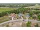 The aerial street view shows three well-maintained homes on spacious lots and long driveways at 14494 Copeland Way, Brooksville, FL 34604
