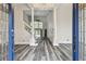 Grand entryway with soaring ceilings showcases an open staircase and stunning pool views at 16003 Ridley Pl, Tampa, FL 33647