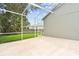View of exterior screened-in patio area at 16003 Ridley Pl, Tampa, FL 33647