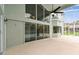 A covered patio overlooking a pool, seamlessly connecting indoor and outdoor living spaces at 16003 Ridley Pl, Tampa, FL 33647