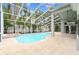 Screened-in pool with a spa offers a private backyard oasis at 16003 Ridley Pl, Tampa, FL 33647