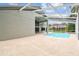 View of screened-in pool and patio of home at 16003 Ridley Pl, Tampa, FL 33647