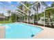 View of the pool and screened enclosure at 16003 Ridley Pl, Tampa, FL 33647