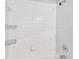 Shower with tiled surround and chrome fixtures at 16003 Ridley Pl, Tampa, FL 33647